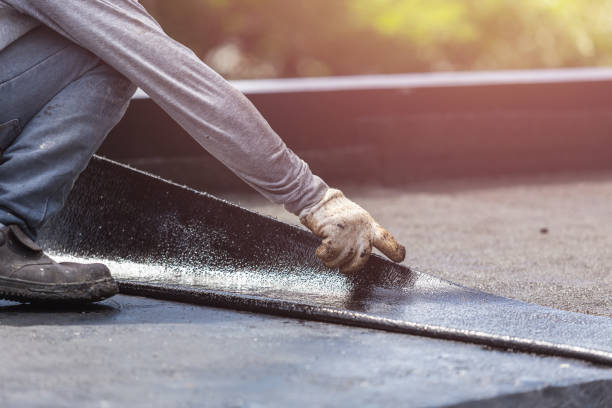 Professional Basement Waterproofing technician working in Sandy Spring, MD
